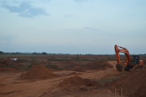 Thondaimani Lake in front of the SIPCOT complex is almost lost as earth movers are preparing the plot for construction